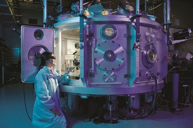 Female scientist working on a space module